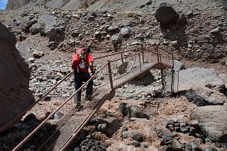19 Agustin Crossing A Metal Bridge Over The Horcones River Before The Final Ascent To Confluencia On The Descent From Plaza de Mulas.jpg